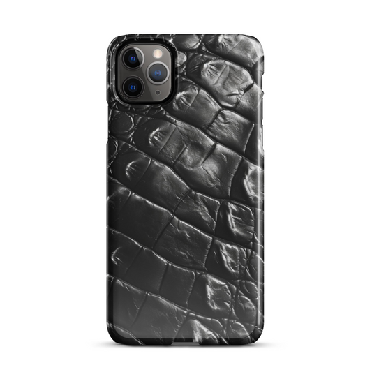 Minimalist black phone case with a smooth crocodile texture for iPhone and Android.